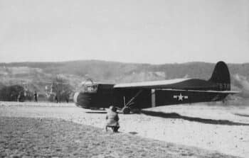 Glider The CG-4A glider with Lt. Suella Bernard in the right-hand seat of the cockpit just as the glider is being snatched by a C-47. (U.S. Air Force photo)